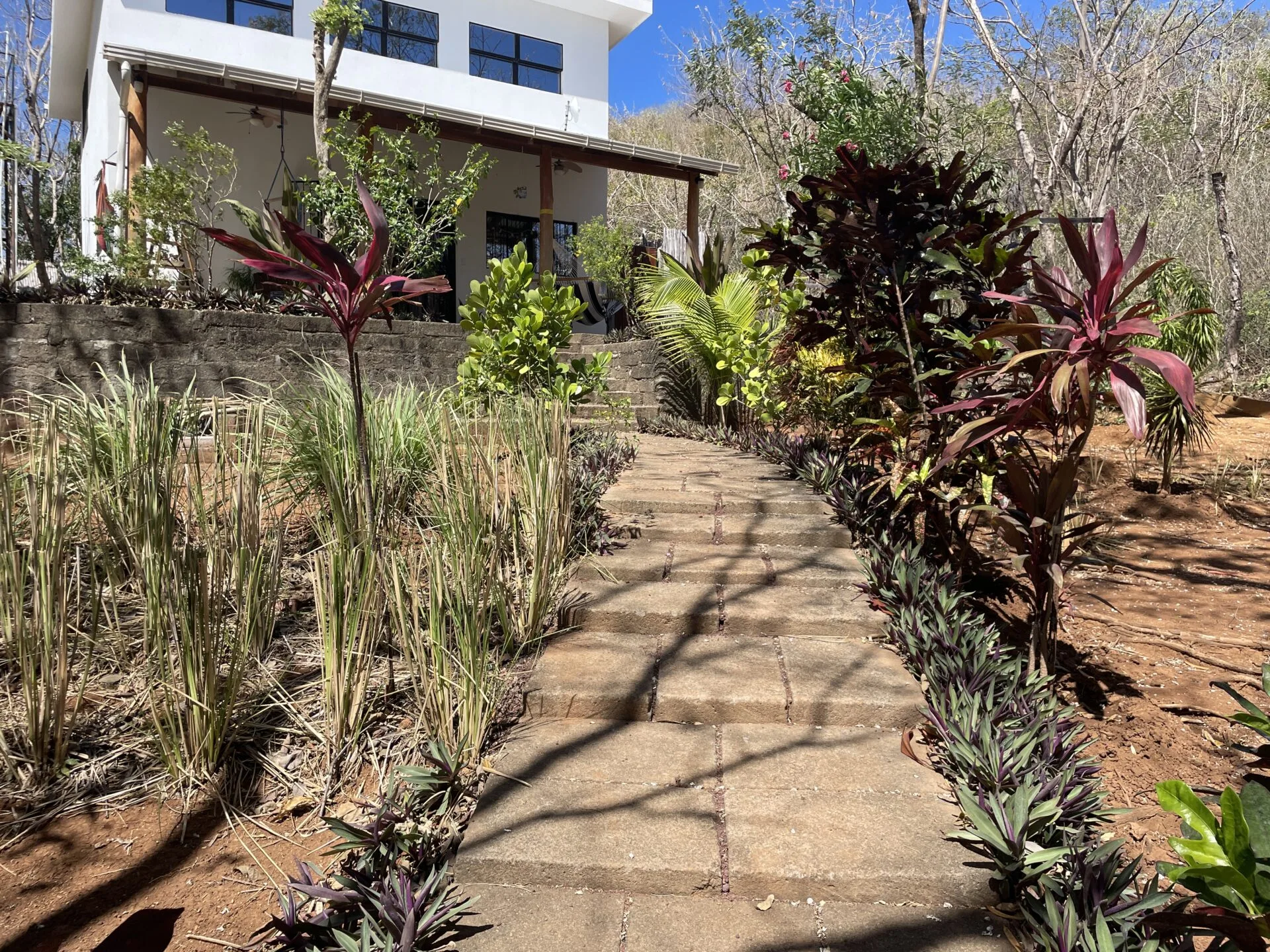 popoyo-surf-villa-with-business-potential-bedroom-front-walk